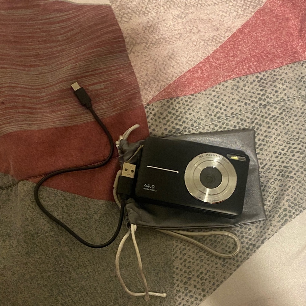 Black Digital Camera with USB Cable